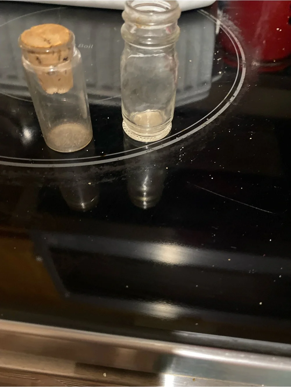 Two vintage miniature medicine bottles